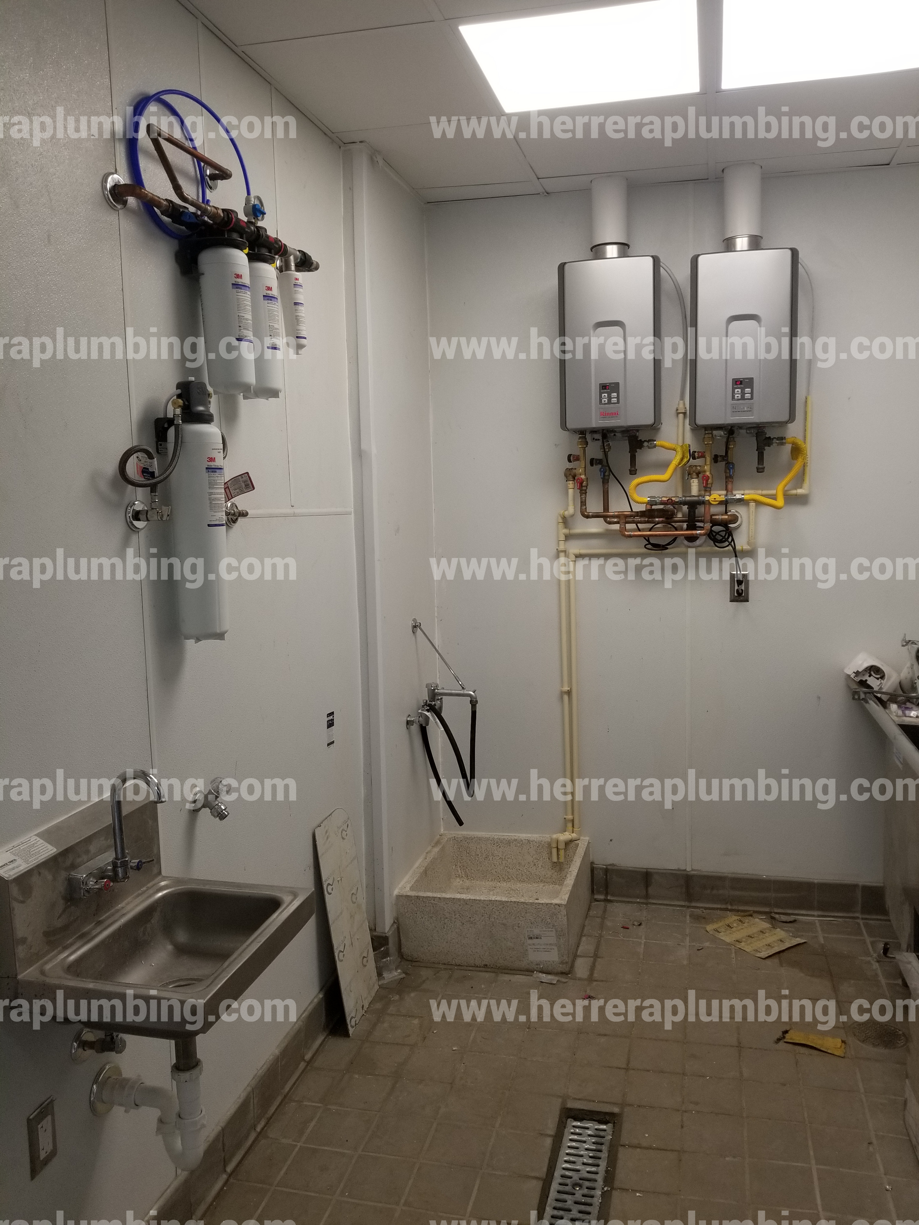 Our Plumber working in a house Our plumber repairing a wash basin